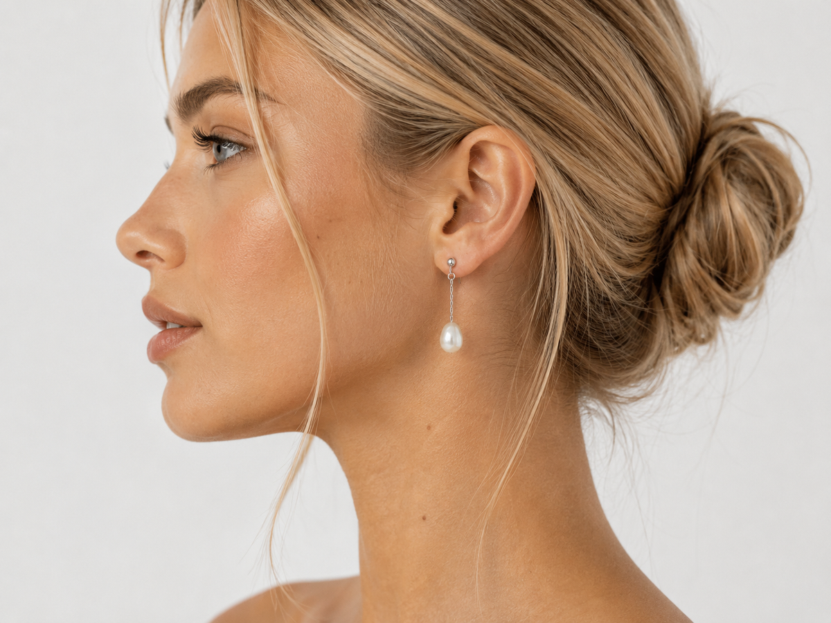 Pendientes plateados con perla