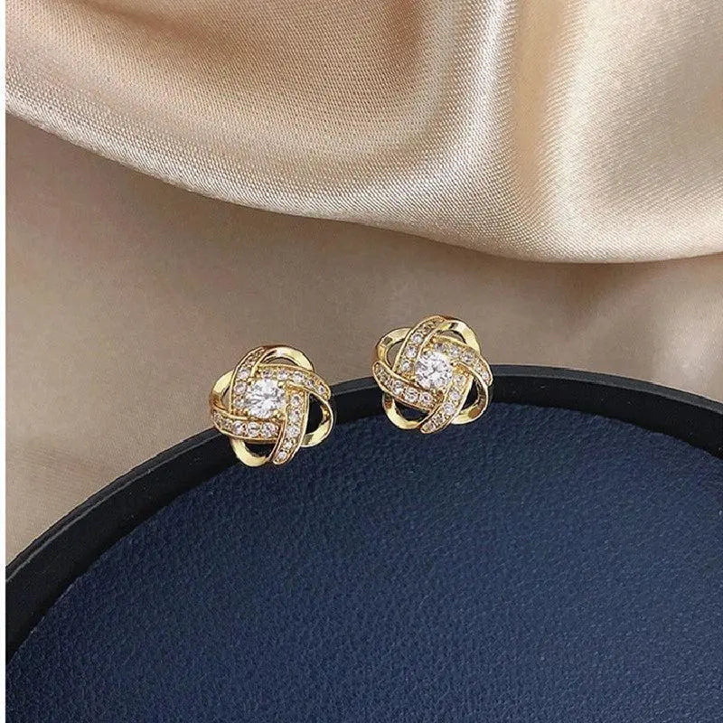 Pendientes dorados en espiral floral-3
