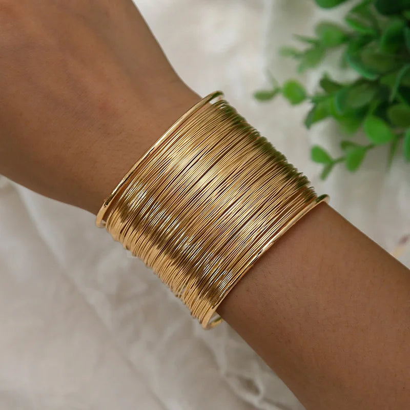 PULSERA DORADA EN FORMA DE C-3