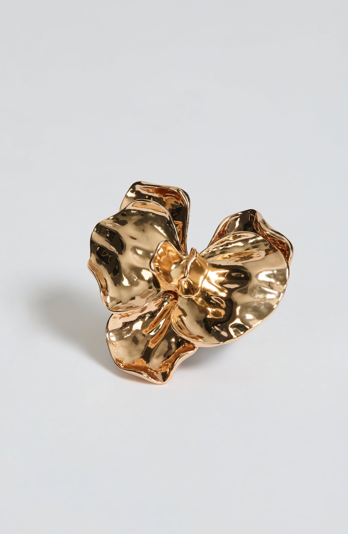 Broche de orquídea dorado