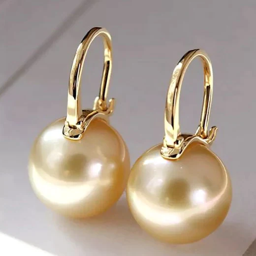Pendientes de aro dorados con perla-3